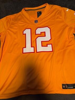 Nike Orange Football Jersey with White and Red Number 12